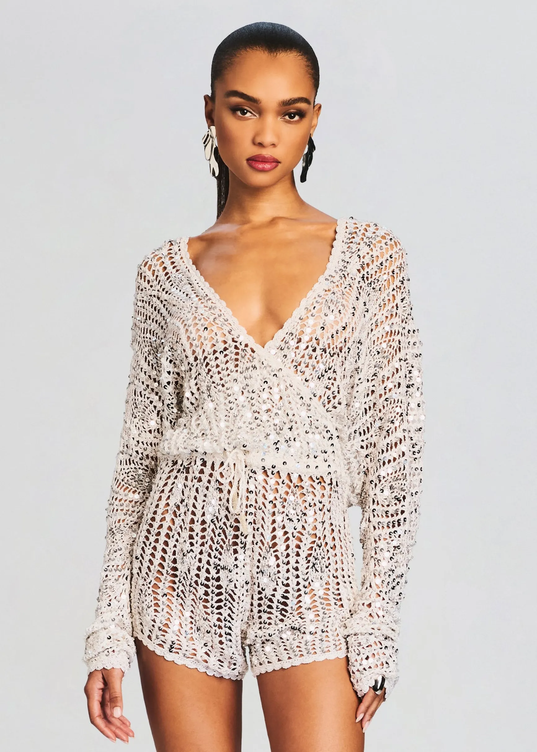 meadow_sequin_crochet_rom_1-3.webp Jumpsuits*Retrofete Meadow Sequin Crochet Romper White/Silver