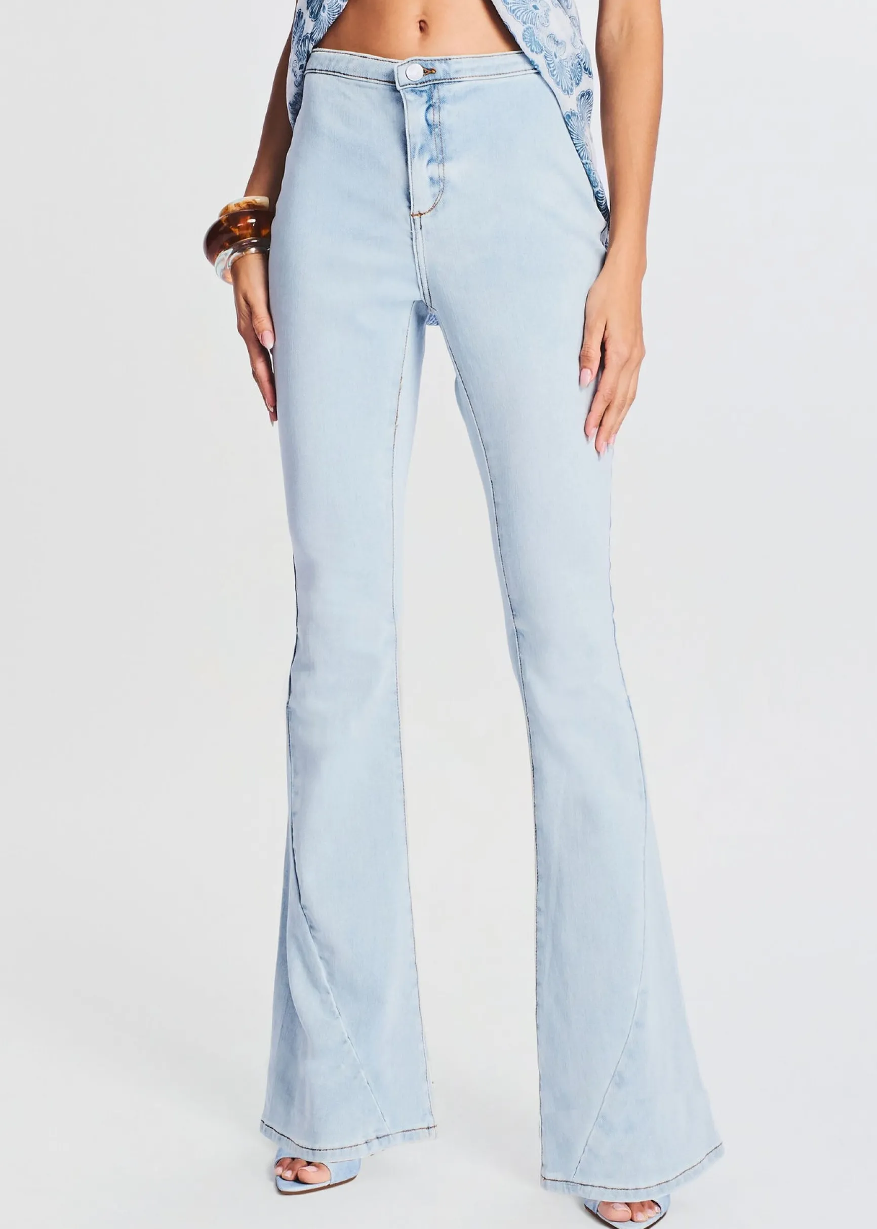 nora_mid_rise_flare_jean_0.webp Bottoms*Retrofete Nora Mid Rise Flare Jean Skylight